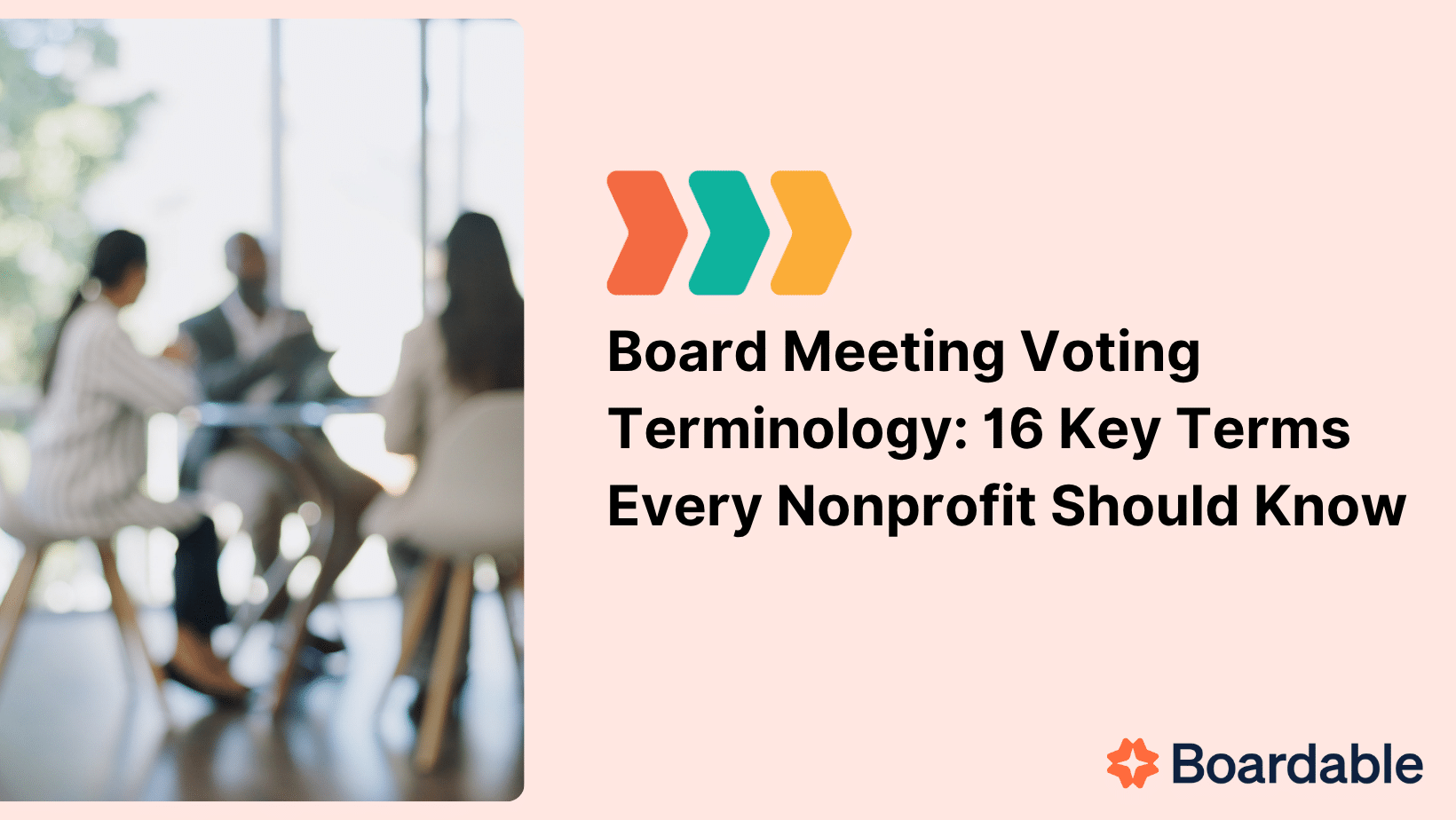 A blurred image of four people in business attire having a meeting around a table in a bright office setting. To the right, bold text reads: 