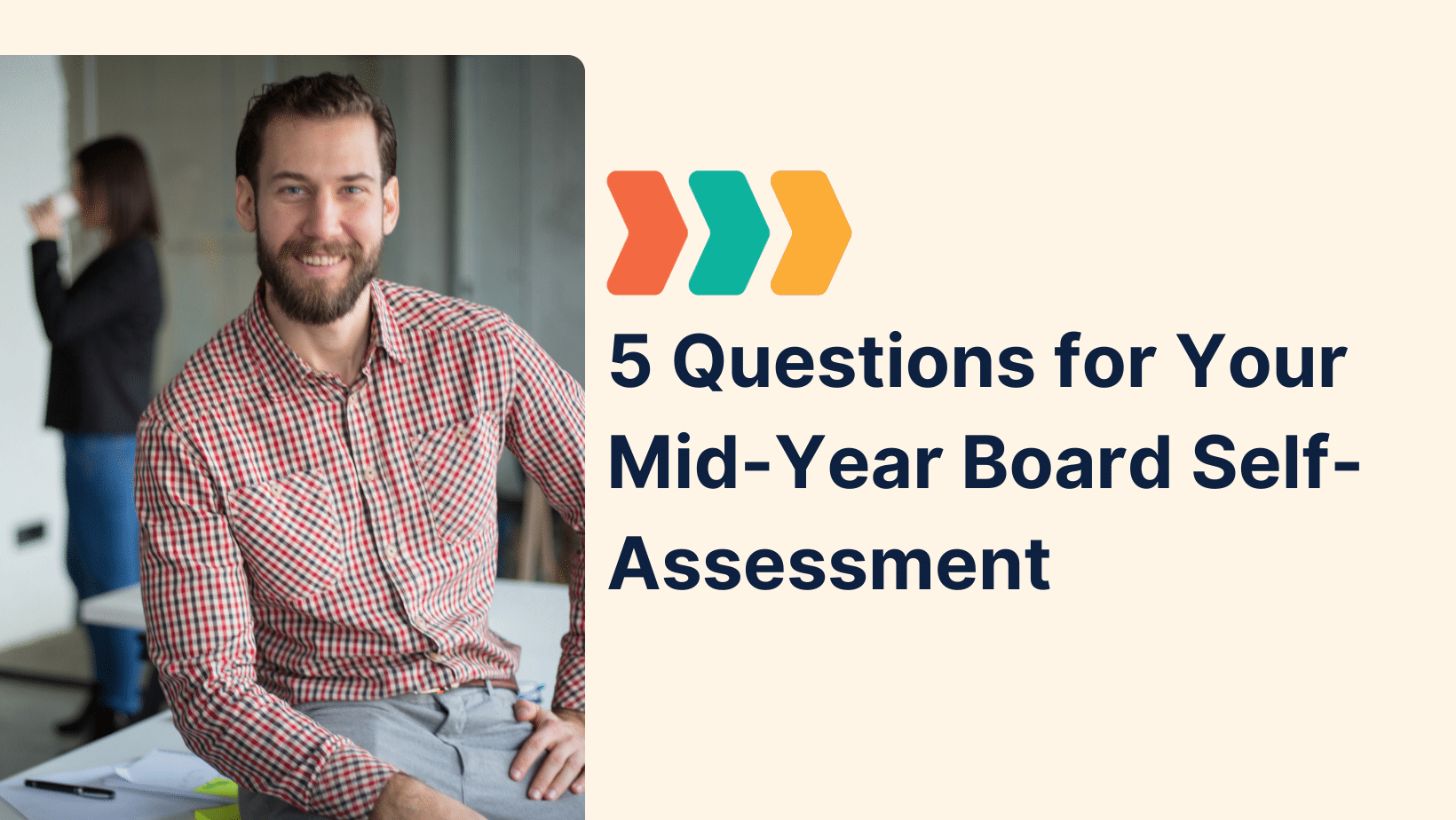 Smiling man in a red and white checkered shirt sitting at a desk, with a blurred colleague in the background, next to text reading ‘5 Questions for Your Mid-Year Board Self-Assessment’ with colorful arrow icons.