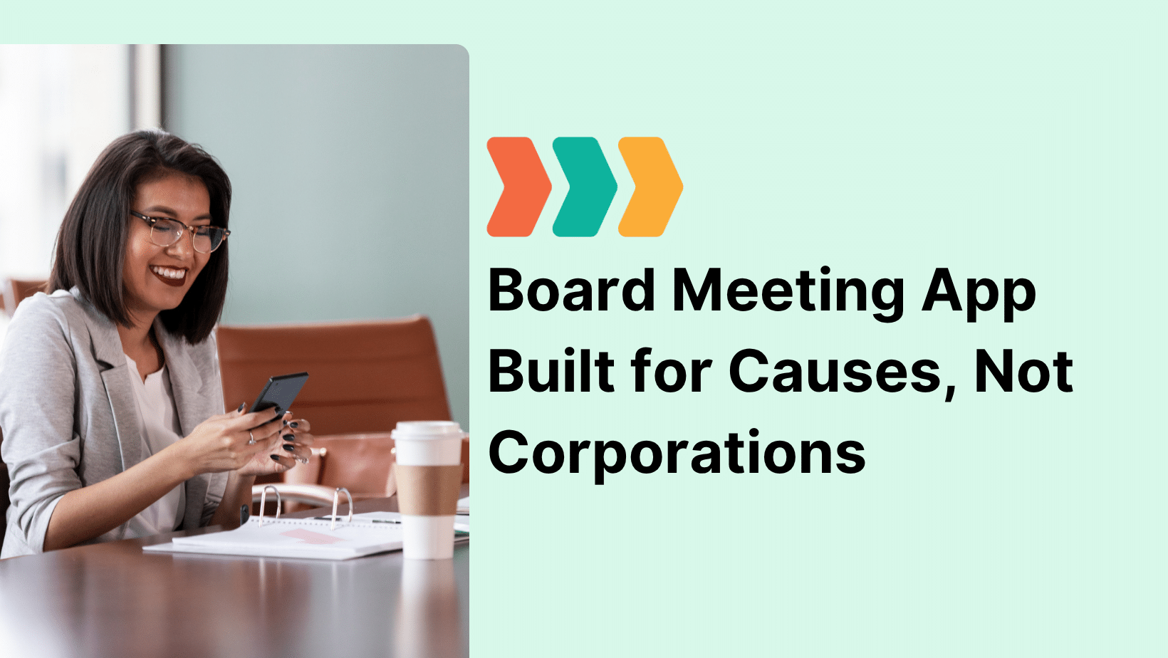 Smiling woman sitting at a conference table checking her phone with a notebook and coffee in front of her, next to Boardable branding and the text “Board Meeting App Built for Causes, Not Corporations,” promoting a board meeting app for nonprofits.