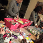 Donations being packed into purses
