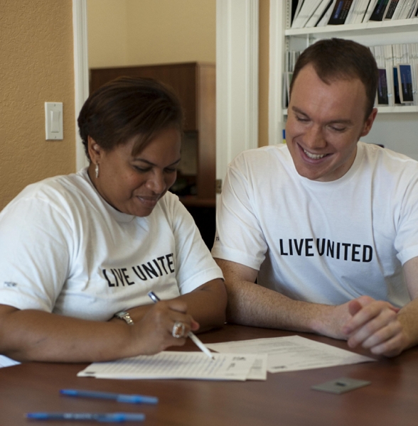 Volunteers at United Way of Central Indiana assist students with tax preparations